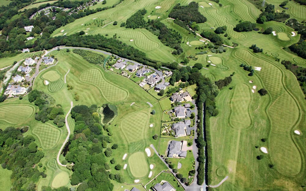 Sweeping fairways and greens seen from above